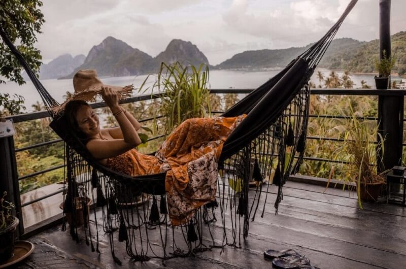 Woman in a Hammock with a Beautiful Backdrop