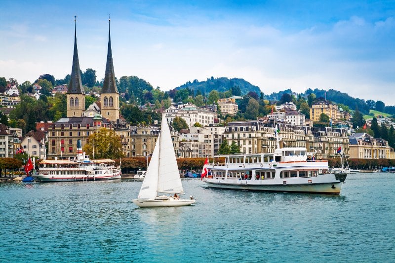 Boats on Lake Lucerne along with Lucerne Cityscape
