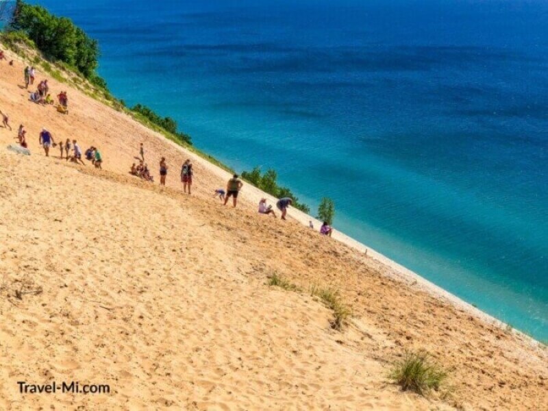 People Walking in a Sand