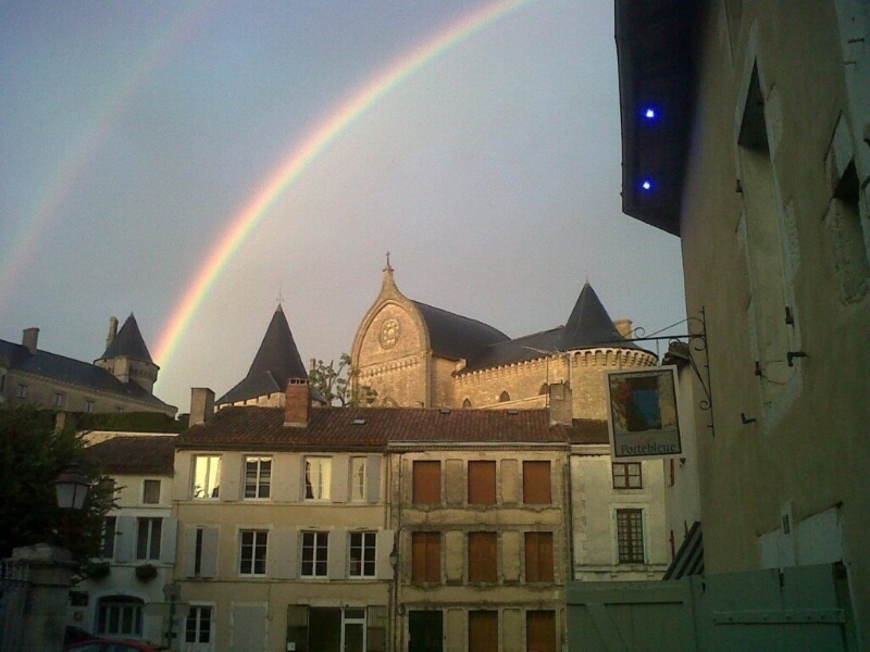 Rainbow Above a Historic Building