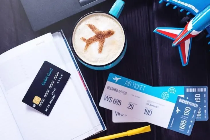 Credit Card with Plane and Air Ticket
