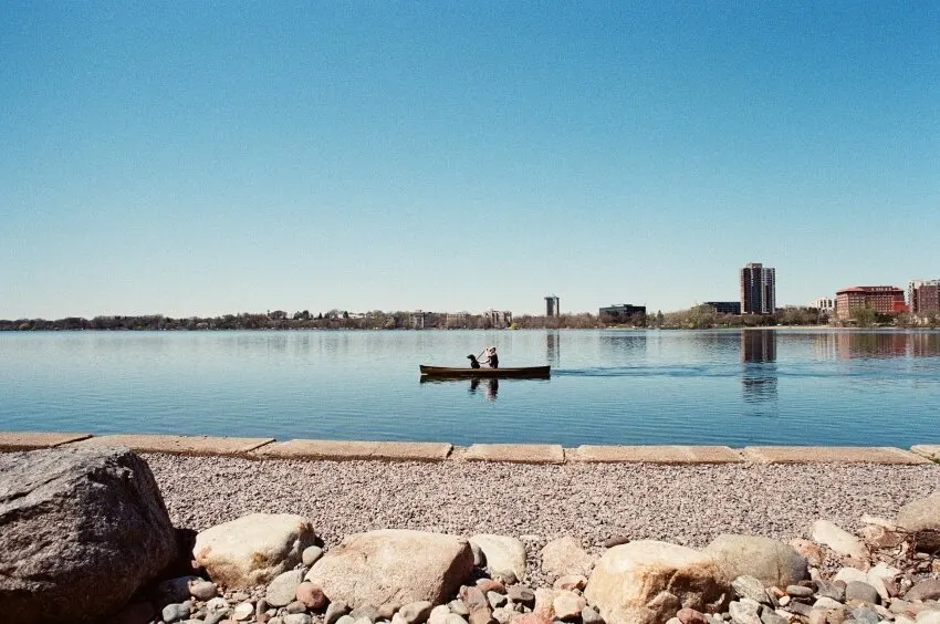 Man in a Lake and Skyline View