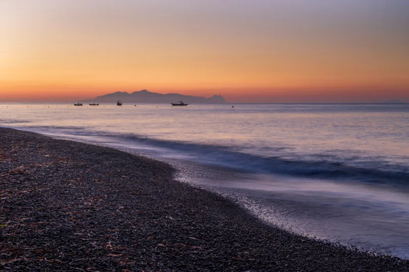Perivolos beach on Santorini island in Greece at sunrise