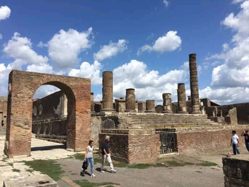People walking through the ancient ruins of Pompeii in Southern Italy