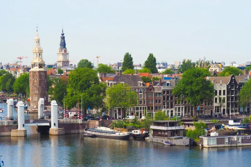 Towers of Amsterdam Along with Canal Houses